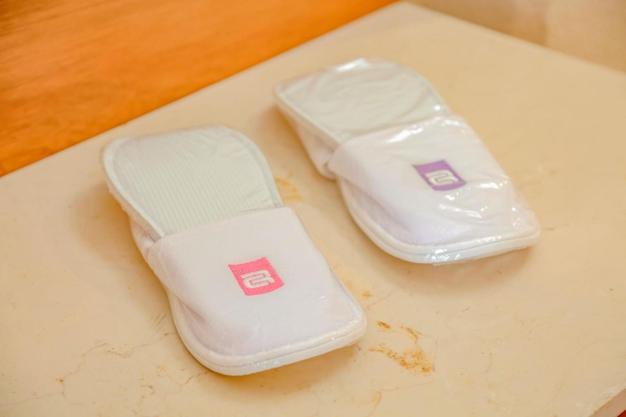 Camino Real Veracruz Eksteriør bilde A pair of hotel slippers